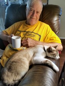 Hank once didn't like cats; Now he was smitten by the kitten.
